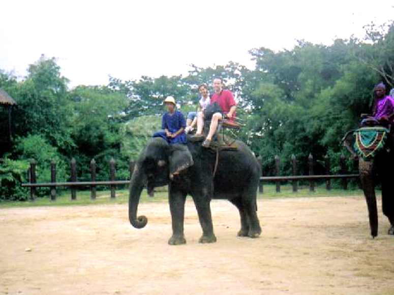 Thailand 2003 - Mike and May on the Elephant